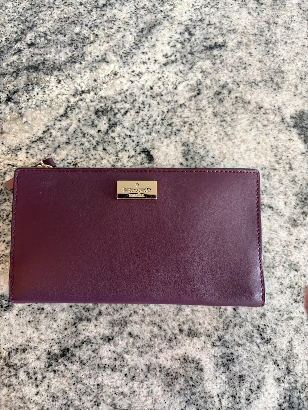 Kate Spade Leather Wallet -
Classic & Stylish